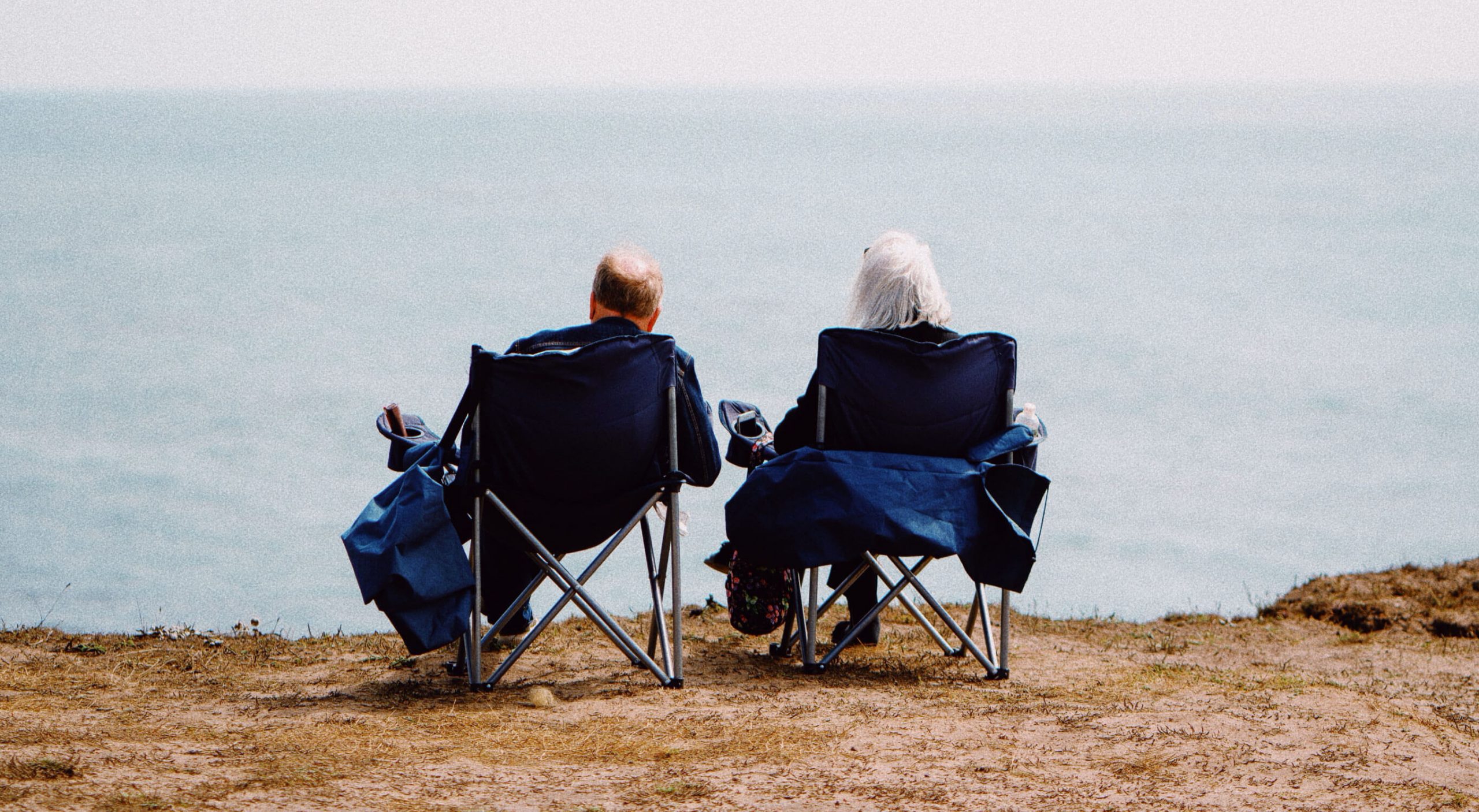 retired couple viewing the shore